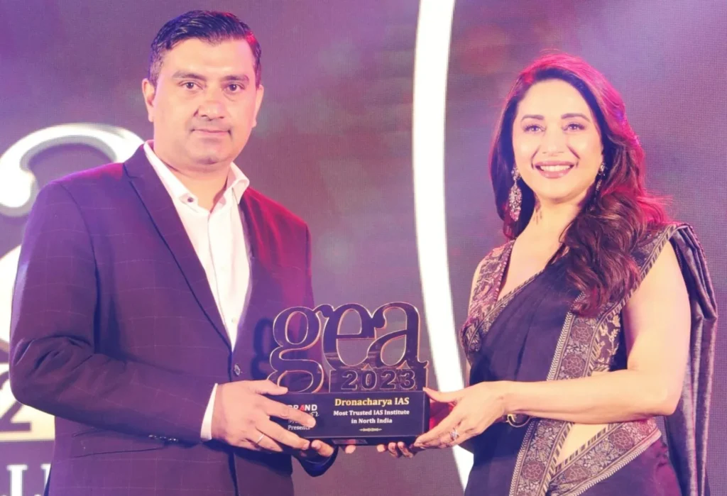 Anurag Bachan Sir with Actress Mrs. Madhuri Dixit Nene Receiving "Global Excellence Award" for The Most Trusted IAS Coaching in North India 